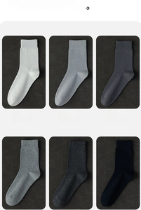 Macro display of men's business mid-calf socks in diverse neutral solid colors