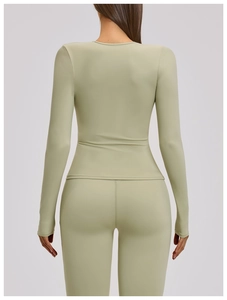 Rear view of long sleeve yoga set in olive green showing slim fit and back silhouette