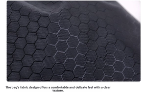 Macro shot of waterproof black nylon fabric with durable honeycomb hexagon texture