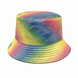 Detailed close-up of holographic rainbow bucket hat with shiny metallic texture surface