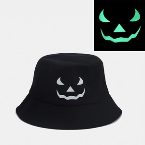 Black Halloween pumpkin glow in the dark bucket hat showing day and green neon night effect