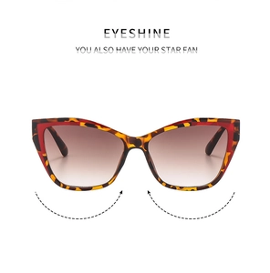 Detail of tortoise shell cat eye sunglasses with brown gradient lenses and nose pads