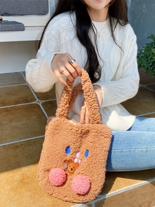 Cute brown plush teddy bear tote bag with blue eyes embroidery and pink pom details