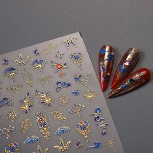 Autocollants à ongles chinois classiques gaufrés d'or avec éventails et papillons