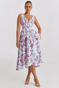 Detailed view of the V-neck sleeveless floral dress with elegant ivory and purple rose pattern