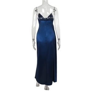 Back view detail of navy blue satin slip dress with zipper on a transparent mannequin
