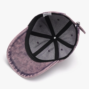 Interior detail of washed cotton baseball cap with sweatband and six-panel stitching