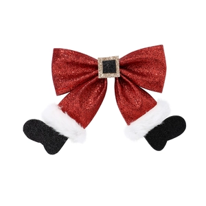 Red glitter Christmas bow with Santa legs and black boots festive hair accessory