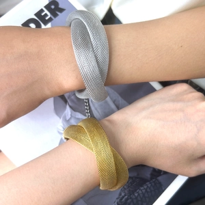 Minimalist flexible mesh wrap bracelets in silver and gold-tone stainless steel finish