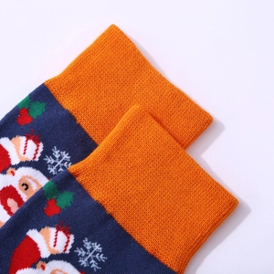 Calze natalizie festive con motivi di Babbo Natale e polsini arancioni a coste per uomo e donna