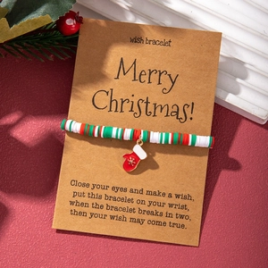 Christmas beaded bracelet with snowflake charm on Merry Christmas gift card display