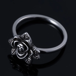 Vintage stainless steel rose skull ring with antique silver finish and detailed petals