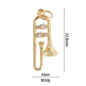 Detailed view of a gold-tone letter pendant with clear crystals, 22.8mm height