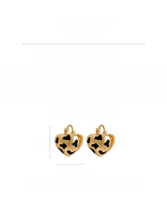 Detail view of heart-shaped leopard print earrings with S925 silver needles and copper base