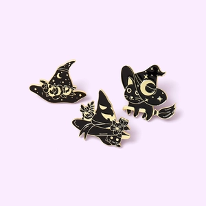 Halloween black cat and witch hat enamel pins with rose and pumpkin details in gold finish