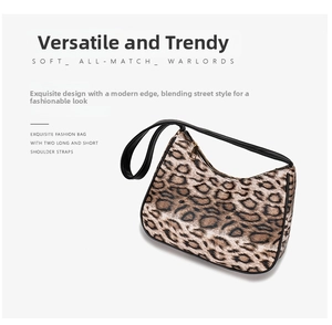 Detail of leopard print hobo bag showing gold metal zipper and dual strap options