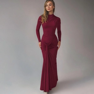 Detailed view of burgundy long sleeve maxi dress featuring high neck and waist knot design