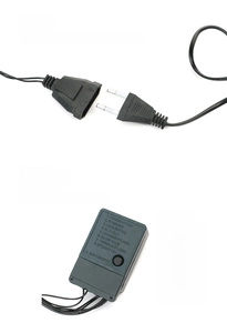 Detail of LED light string controller and tail plug showing 8 modes and serial connection