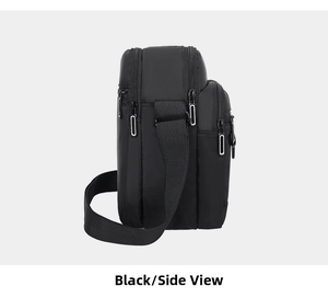 Side view of black oxford fabric shoulder bag showing zipper layers and storage space
