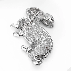 Detailed view of the silver rabbit brooch back showcasing the sturdy safety pin clasp