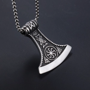 Vintage Viking axe pendant necklace in stainless steel with Nordic runes on grey background