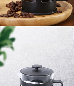 Detail of heat-resistant borosilicate glass French press with high-density steel filter