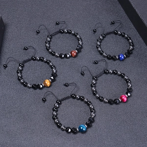 Detail of five 8mm natural stone beaded bracelets with adjustable braided ropes