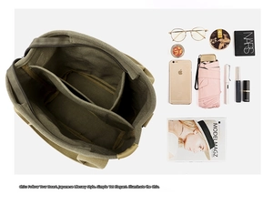 Detailed interior of khaki canvas tote bag showing large capacity compartments and organizers