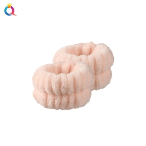 Absorbent pink coral fleece wristbands for washing face and preventing water runoff