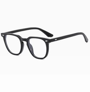 Detail of glossy black square eyeglass frames showing anti-slip temple texture on white