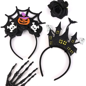 Detail of Halloween headbands with glitter pumpkin, spider web and ghost castle designs