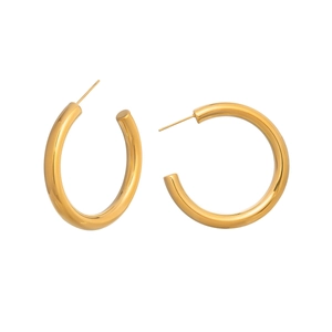 Detailed view of glossy 18K gold-plated C-shaped stainless steel hoop earrings for women