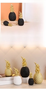 Macro detail of textured resin pineapple decor with realistic golden top leaves finish