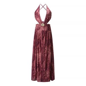 Detail of burgundy leopard dress with gold flower buckle and waist cut-out accents