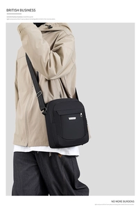 Close-up of black waterproof crossbody bag featuring British style and logo details