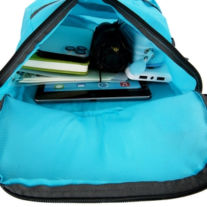 Spacious main compartment of blue grid nylon folding backpack with daily essentials