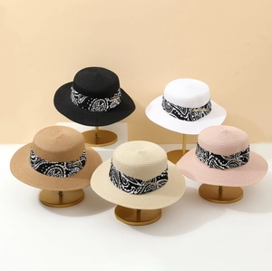 Straw sun hats for women and men in five colors with paisley bands and wide brims