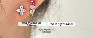 Macro shot of a cross and triple heart zircon stud earring set with 0.8mm stem thickness