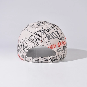 Detail view of graffiti baseball cap featuring metal buckle and adjustable back strap