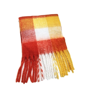 Classic red and yellow plaid scarf with thick knit texture and decorative fringes