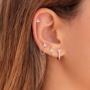 S925 sterling silver U-shaped hook earrings with cubic zirconia worn by a model