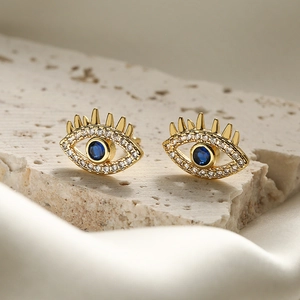 Minimalist gold-plated evil eye stud earrings with white zircons and blue center stone