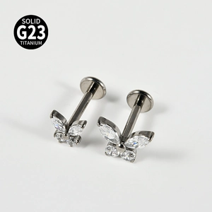 Detailed macro view of butterfly stud in solid G23 titanium with zircon stones