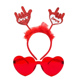 Red sequin heart headband and heart sunglasses set with festive feather details