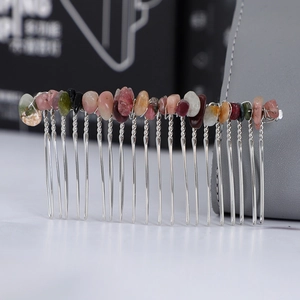 Handmade silver hair comb featuring multicolored raw natural crystals and stones