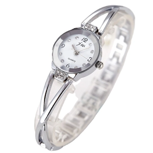 Silver women's bangle watch with crossover rhinestone band and white quartz dial