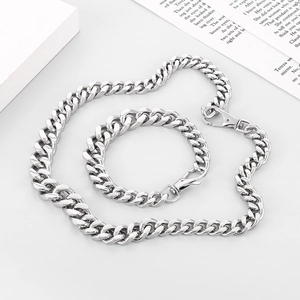 Close-up of silver Miami Cuban link necklace and bracelet set with lobster clasp