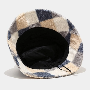 Plaid lamb wool bucket hat in beige and blue featuring adjustable inner drawstring