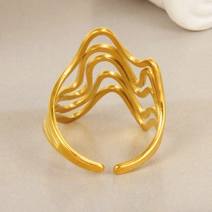 Detailed close-up of a 304 stainless steel wavy open ring with layered golden lines