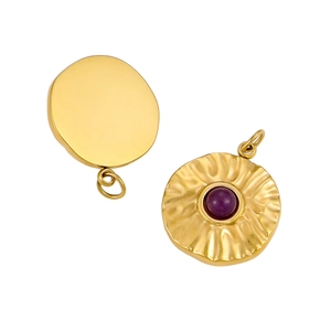 Detailed view of gold textured round pendant with inlaid purple gemstone and mirror back